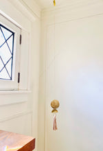 Load image into Gallery viewer, Brass and Blush Pink Tassel Lightcatcher