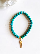 Load image into Gallery viewer, Turquoise Magnesite Stretch Bracelet with Feather Charm