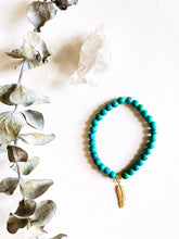 Load image into Gallery viewer, Turquoise Magnesite Stretch Bracelet with Feather Charm