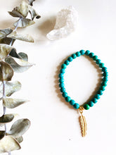 Load image into Gallery viewer, Turquoise Magnesite Stretch Bracelet with Feather Charm