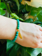 Load image into Gallery viewer, Turquoise Magnesite Stretch Bracelet with Feather Charm