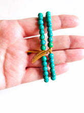 Load image into Gallery viewer, Turquoise Magnesite Stretch Bracelet with Feather Charm