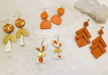 Load image into Gallery viewer, Orange Speck & Brass Dangle Earrings